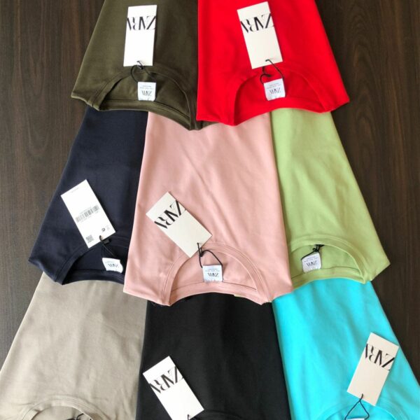 Front view of unisex tee in multiple colors