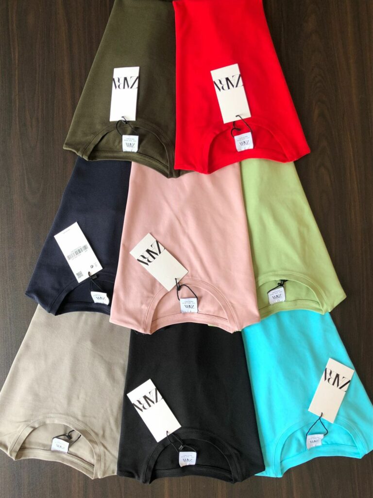 Front view of unisex tee in multiple colors
